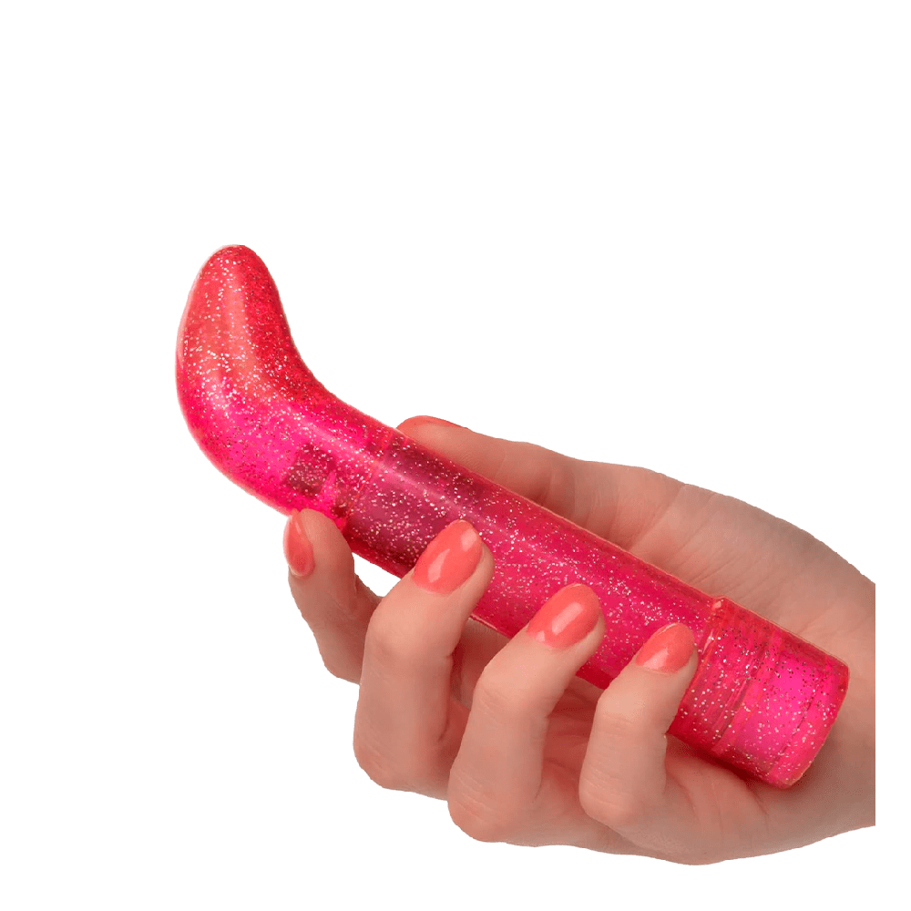 Vibrador para punto G Sparkle Pink con energia a pilas AA, acabado glitter rosa femenino